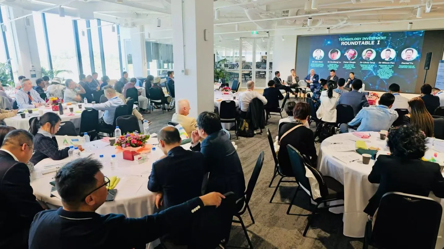 The technology investment roundtable session at the HIGH 5 conference: a panel on stage and more than a hundred delegates seated across the room.